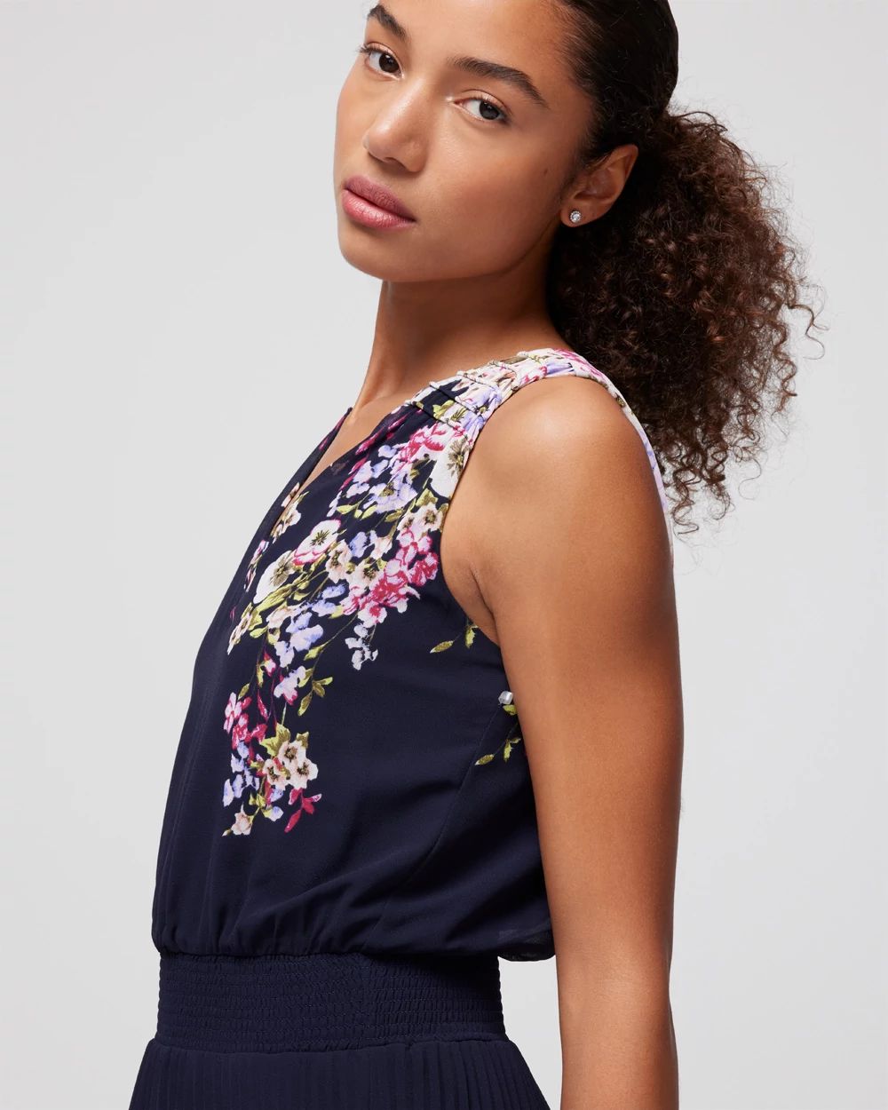 Sleeveless Smocked V-Neck Pleated Midi Dress click to view larger image.