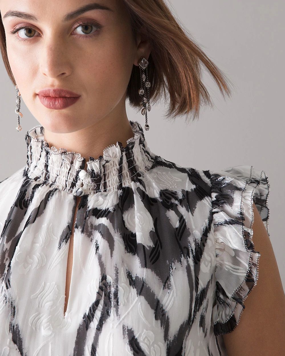 Sleeveless Mock Neck Burnout Blouse